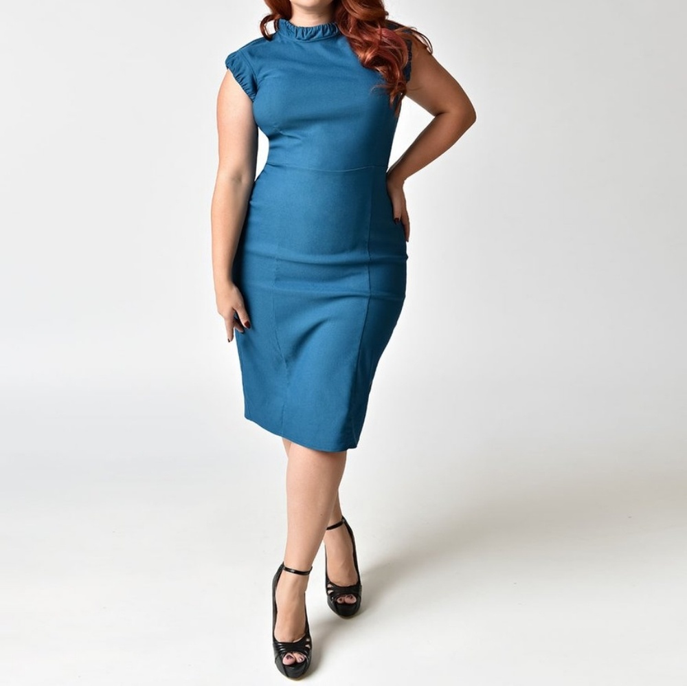 Unique vintage 1960s teal wiggle dress